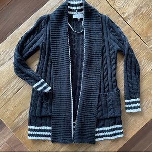 Black and white Varsity style cable knit sweater